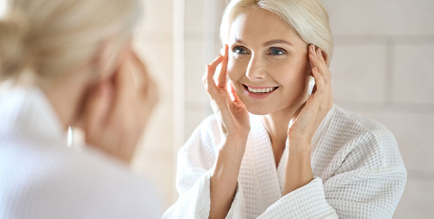 Woman in her 50s with healthy glowing skin