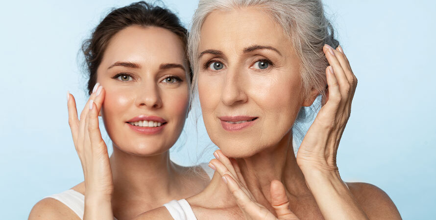 Two women of different ages and skin types comparing skincare